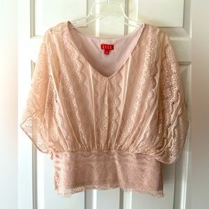 Lacy, feminine top by Elle.